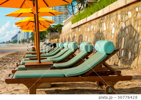 chairs and umbrella on stunning tropical beach chairs and umbrella on stunning tropical beach 30776428