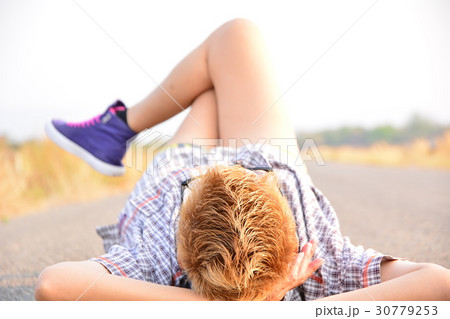 Woman relax on road and under the sky Woman relax on road and under the sky 30779253