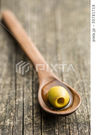 The green olives. 30781718