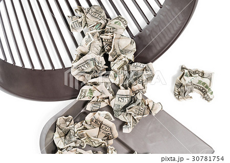 Money in a trash can and bucket 30781754