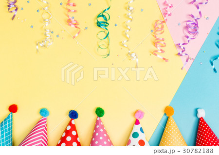 Party theme with with hats and streamers 30782188
