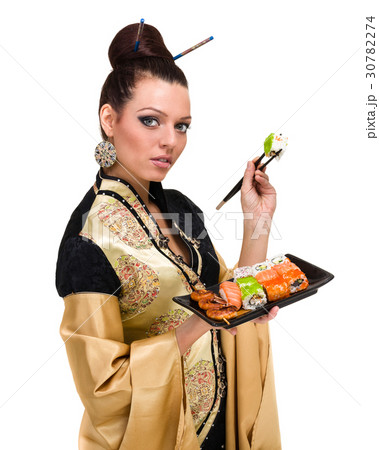 woman in traditional dress with eastern food 30782274