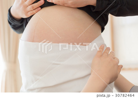 woman during pregnancy or shortly after childbirth 30782464