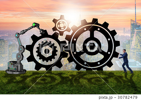 Teamwork concept with businessman and cogwheels 30782479