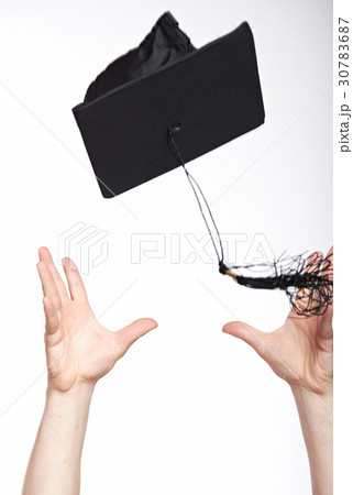 catching graduation hat in air catching graduation hat in air 30783687