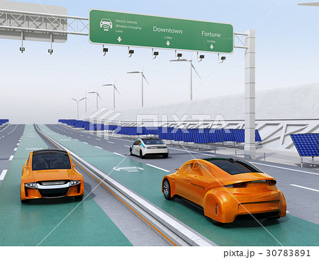 高速道路非接触充電優先レーンに走行している電気自動車。道路側に太陽光、風力発電設備が設置されている 高速道路非接触充電優先レーンに走行している電気自動車。道路側に太陽光、風力発電設備が設置されている 30783891