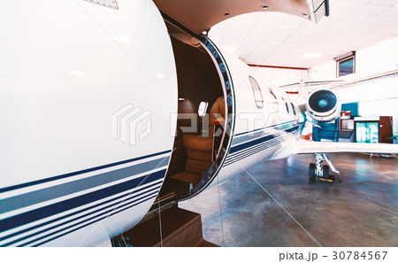 Private jet in a hangar Private jet in a hangar 30784567
