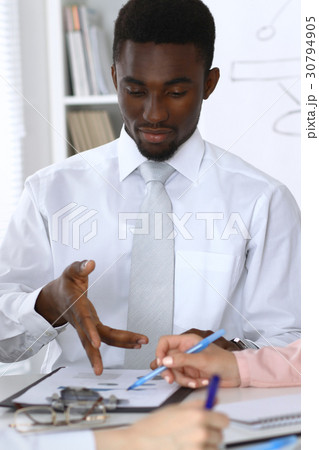 African american businessman at meeting in office African american businessman at meeting in office 30794905