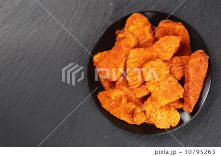 turkey and chicken nuggets on stone tray 30795263