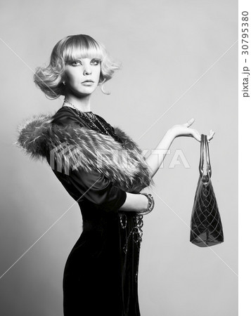 Young beautiful lady in elegant dress 30795380