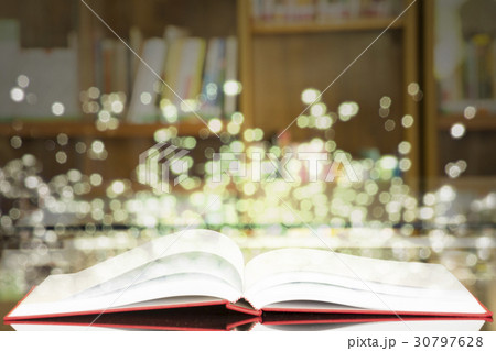 Opened book with magic light. business idea. Opened book with magic light. business idea. 30797628