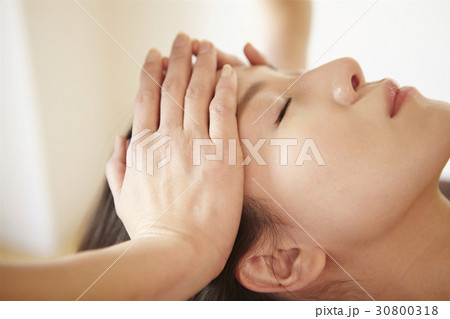A photo of a facial massage. A photo of a facial massage. 30800318