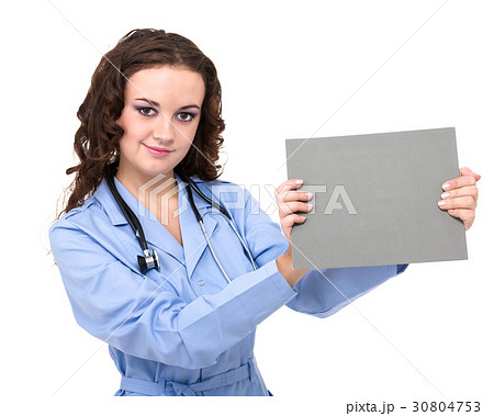 Young woman doctor showing empty blank clipboard Young woman doctor showing empty blank clipboard 30804753
