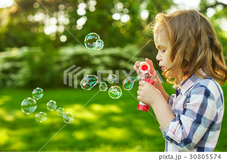Girl and soap bubbles Girl and soap bubbles 30805574