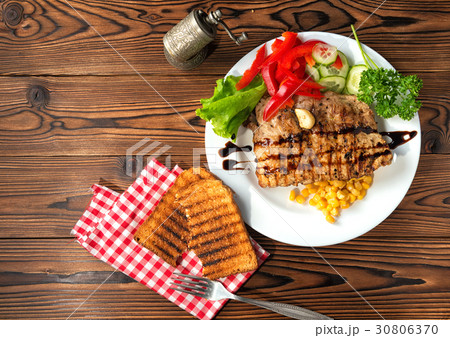 top view of grilled meat and vegetables, toast 30806370