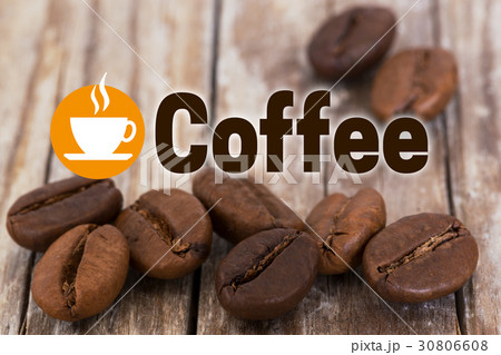 Coffee concept background with coffee beans and wood Coffee concept background with coffee beans and wood 30806608