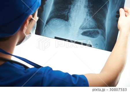 doctor look at x-ray image doctor look at x-ray image 30807583