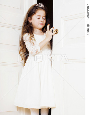 little cute girl at home, opening door well little cute girl at home, opening door well 30809907