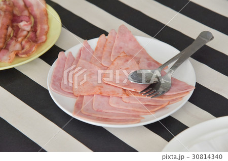 ham in white plate 30814340