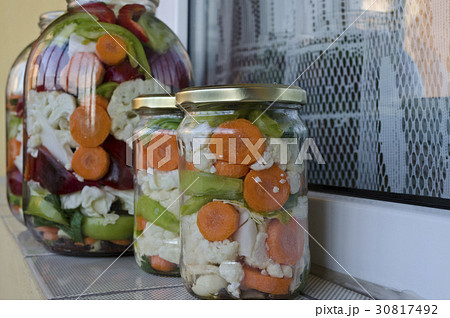 Pickled organic vegetables in glass jars Pickled organic vegetables in glass jars 30817492