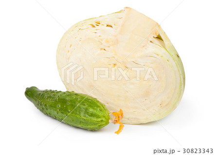 Cabbage and cucumber on the wooden table 30823343