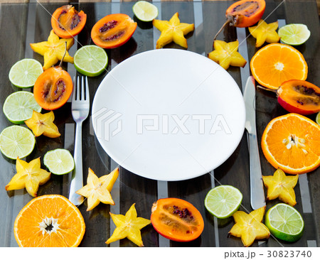 cut exotic fruits and crockery cut exotic fruits and crockery 30823740