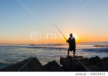 Fisherman Silhouetted  Ocean Beach Sunrise 30829922