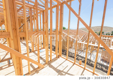 Wood Home Framing Abstract At Construction Site. Wood Home Framing Abstract At Construction Site. 30830847