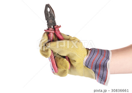 Pliers in a man's hand isolated on white Pliers in a man's hand isolated on white 30836661
