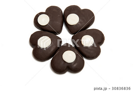 Cookie heart in chocolate isolated 30836836
