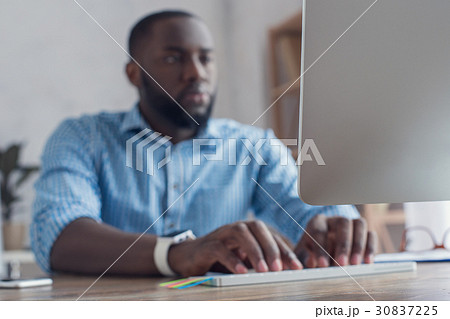 Young african man working in the office business 30837225