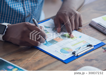 Young african man working in the office business Young african man working in the office business 30837232