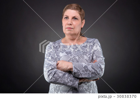 Portrait of dreaming senior woman 30838370