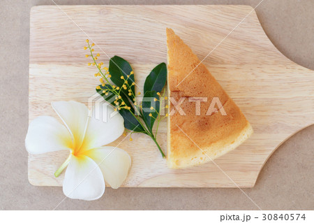 Japanese Cheesecake, top view on wooden plate. 30840574