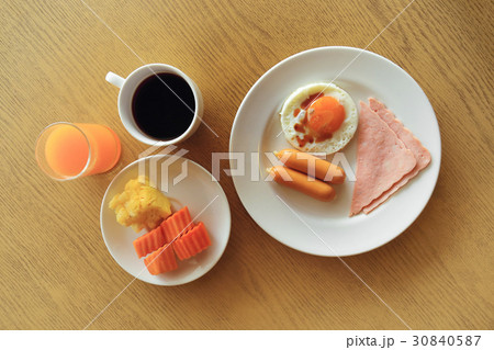 Set of american breakfast, fried egg, ham, sausage 30840587
