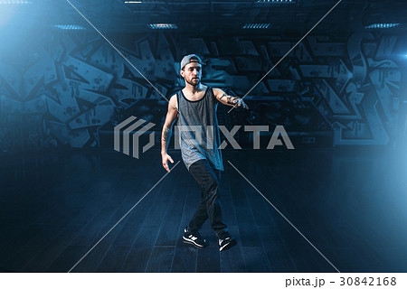 Male rapper in dance studio, trendy lifestyle 30842168