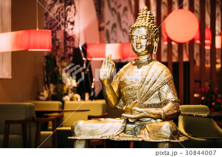 Statue Of Buddha Sitting In Lotus Position With 30844007