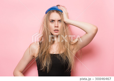Tired sleepy woman just woke up and yawning Tired sleepy woman just woke up and yawning 30846467