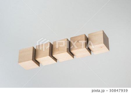 float wood cube on grey background float wood cube on grey background 30847939