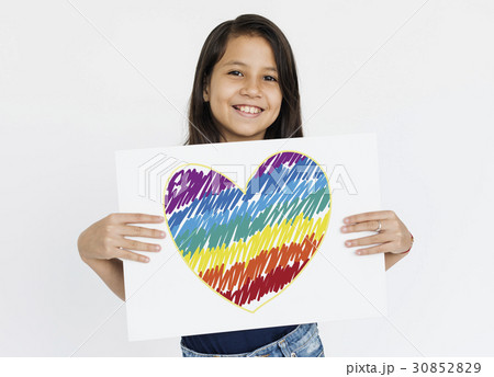 Woman holding placard with LGBT heart icon 30852829