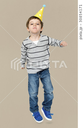 Little Boy Wearing Party Hat Studio Portrait 30854171