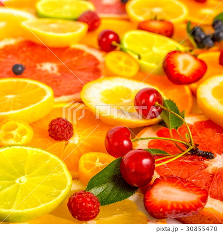 fresh sliced mixed citrus fruits as background fresh sliced mixed citrus fruits as background 30855470