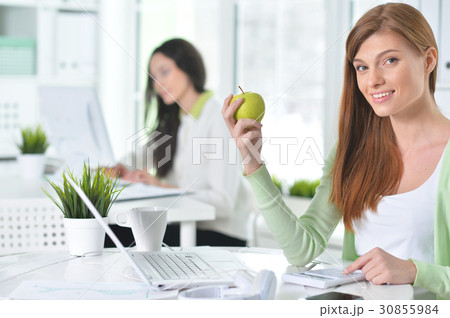 Portrait of a nice business woman with a laptop 30855984