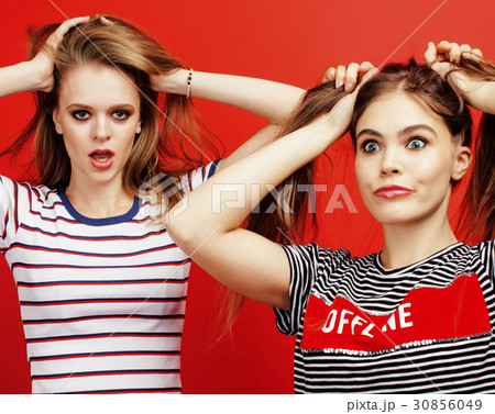 two best friends teenage girls together having fun two best friends teenage girls together having fun 30856049