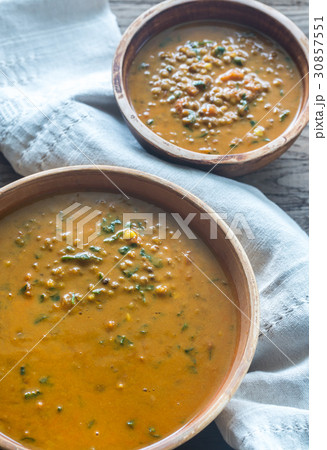 Two bowls of lentil curry 30857551