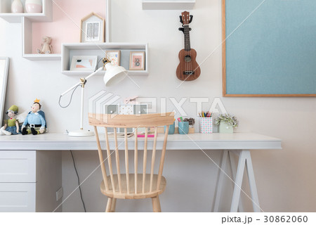 Stationery on the desk in kid's room at home. 30862060