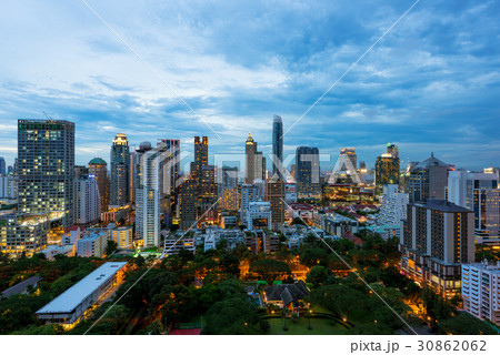 City skyline at sunset with skyscrapers City skyline at sunset with skyscrapers 30862062