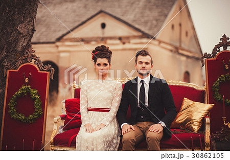 elegant couple sitting 30862105