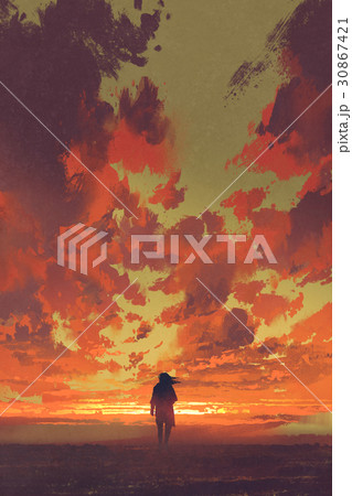 lonely man looking at fiery sunset sky lonely man looking at fiery sunset sky 30867421
