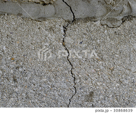 A crack in the concrete wall. A crack in the concrete wall. 30868639